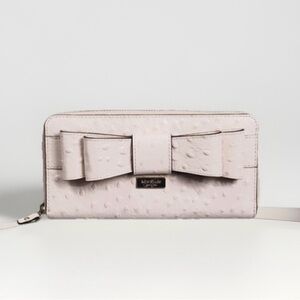 Kate Spade blush pink ostrich leather Large Bow zip round wallet